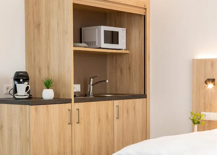 Апарт-отель Am Pfaffenstein Klein-Winternheim